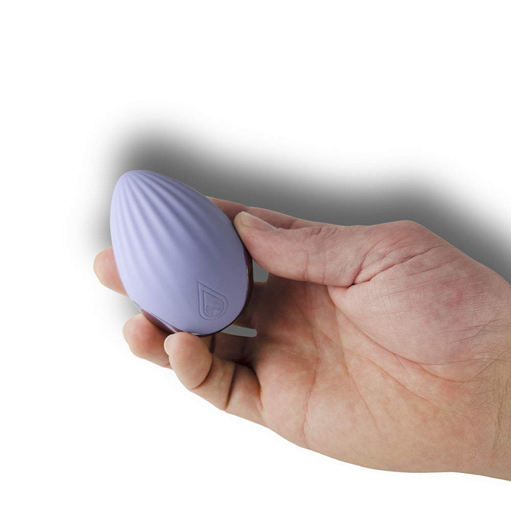 NIYA 4 Rechargeable Silicone Palm Held Massager Cornflower - Fantasies Boutique